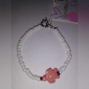White Beaded Bracelet with Pink Flower Accent